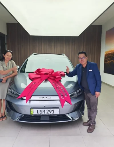 Terrence Foo delivering BYD Atto 2 to happy customer in BYD Cheras Millennium Motors, Kuala Lumpur.