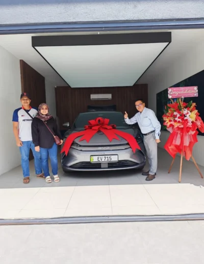 Terrence Foo delivering BYD Dolphin to happy customer in BYD Cheras Millennium Motors, Kuala Lumpur.