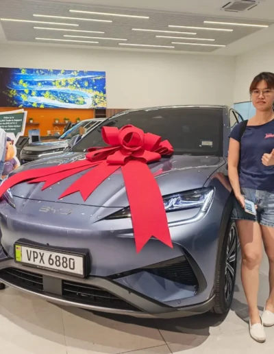 Terrence Foo delivering BYD Seal to happy customer in BYD Cheras Millennium Motors, Kuala Lumpur.
